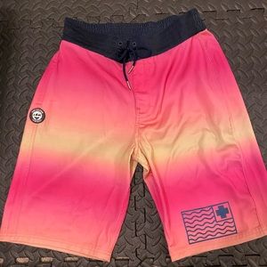 Pink Dolphin Swim Trunks